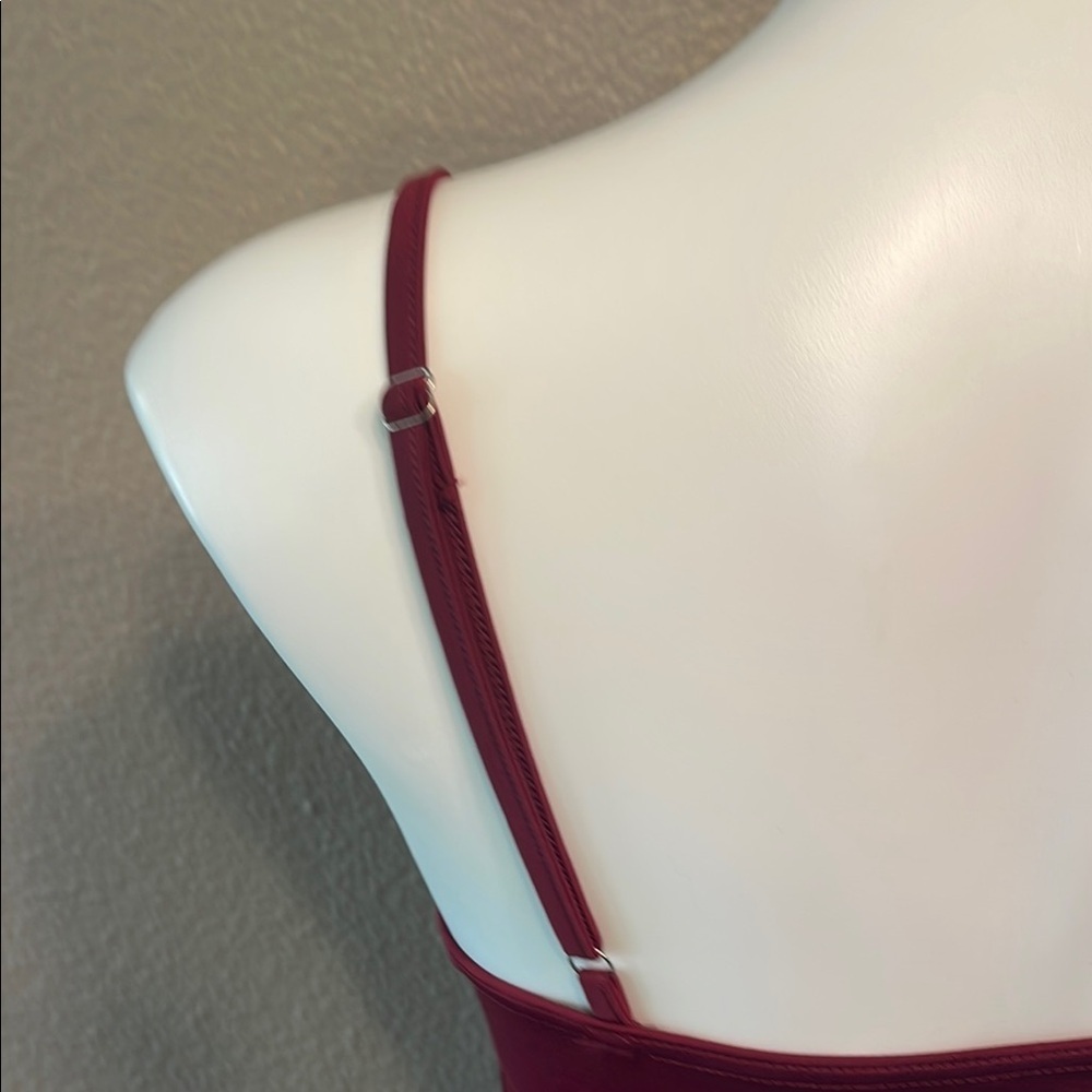 Elegant Asymmetrical Burgundy Dress with Chic Open Areas - Picture 5 of 9